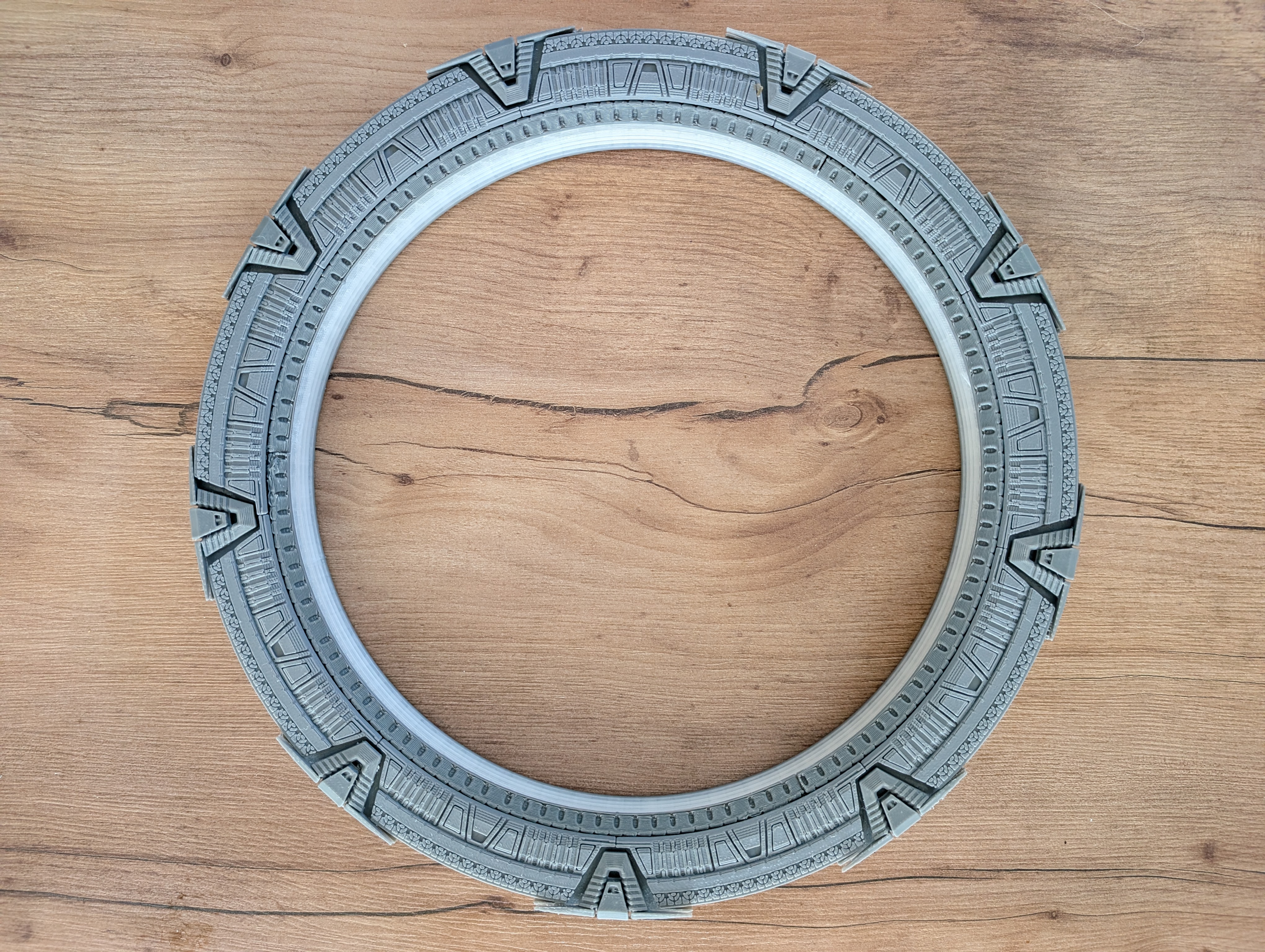 Bare 3D printed Pegasus Medium ring with chevrons attached, unpainted